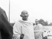Indian statesman and activist Mohandas Karamchand Gandhi (1869 - 1948) at Ramgarh, 1939. With him is Deepak Chaudhry, son of Saraladevi Chaudhry, a relative of Rabindranath Tagore. (Photo by Dinodia Photos/Getty Images)