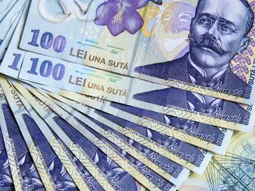 Banknotes of Romania pattern background, in Slanic Moldova, Romania.