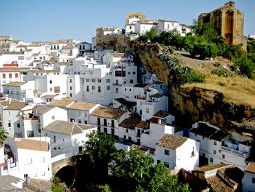 Setenil de las Bodegas is one of White Towns of Andalusia, or Pueblos Blancos, which are series of towns and large villages in northern part of provinces of Cádiz and Málaga in southern Spain.All of villages are characterised by whitewashed walls and red or brown tiled roofs.