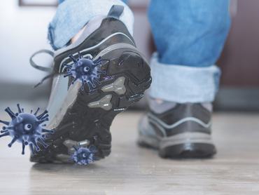 Concept of harmful bacteria on the sole of shoe. 3d illustration