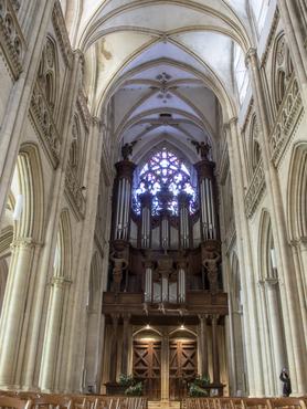 View of the entrance and the organ battery of the Cathedral of Notre-Dame de Coutances in Gothic style dating from the thirteenth century