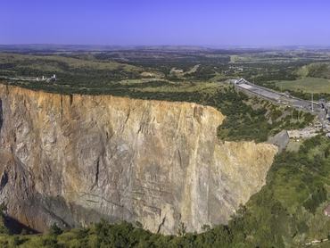 Cullinan diamond mine showing the big hole where the famous largest diamond was discovered, a rough gem-quality diamond at 3106.75 carats