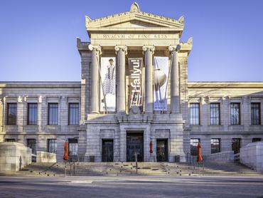 Boston, MA, USA - April 14, 2024: view of the architecture of the iconic Museum of Fine Arts Boston - MFAB in Boston, Massachusetts, USA on a sunny spring day.