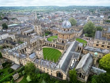 Oxford, United Kingdom. Aerial view of the College Library. Remarkable architecture of University campuses - view from above. High quality 4k footage