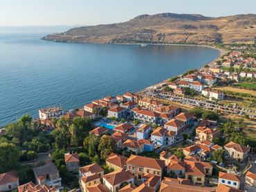 This is a drone photo of the seaside village of Petra on Lesbos island, Greece. It is located on the north west side of the island and it is one of the most touristic places.