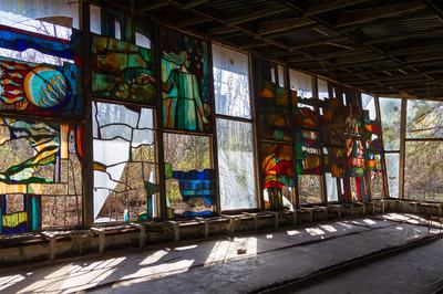 Stained-glass windows are seen at the Prypiat cafe in Prypiat, a city abandoned after the Chornobyl accident, Kyiv region, Ukraine, on April 14, 2026. April 26, 2026, marks the 40th anniversary of the explosion of the fourth reactor at the Chornobyl Nuclear Power Plant, which occurred on April 26, 1986. The accident remains one of the most significant incidents in the history of nuclear energy. (Photo by Kyrylo Chubotin/Ukrinform/NurPhoto via Getty Images)