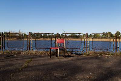 A chair is on the waterfront at the Prypiat river transport stop in Prypiat, a city abandoned due to the Chornobyl disaster, Kyiv region, Ukraine, on April 14, 2026. April 26, 2026, marks the 40th anniversary of the explosion of the fourth reactor at the Chornobyl Nuclear Power Plant, which occurred on April 26, 1986. The accident remains one of the worst man-made disasters in the history of nuclear energy. (Photo by Kyrylo Chubotin/Ukrinform/NurPhoto via Getty Images)