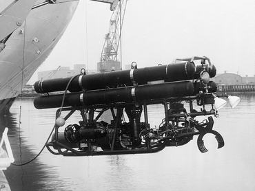 (Original Caption) March 29, 1966 - Palomares, Spain: This U.S. Navy undersea robot called CURV may get a chance to lift America's missing H-bomb out of the Mediterranean sea from a depth of 2,500 feet. CURV, which stands for Cable-controlled Underwater Research Vehicle, is 6 feet high, 5 feet wide, and 13 feet long. It goes beneath the sea equipped with a television camera to search for objects and a remotely operated claw to life them to the surface. CURV was designed by Naval Ordnance Test Station at Pasadena, California , to retrieve such objects as stray torpedoes fired off the California coast.
