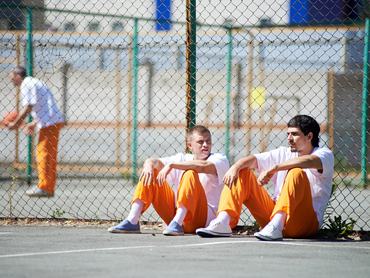 Prisoners communicating during walk