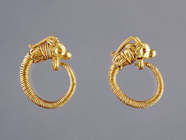 Ancient Greek Hoop Earrings with Antelope Head Finials, gold, made in Alexandria, Egypt, c. 220-100 BC, 2.2 cm diameter (7/8 in.), J. Paul Getty Museum, Malibu, California. (Photo by VCG Wilson/Corbis via Getty Images)