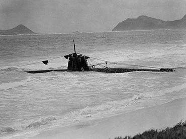 A captured Japanese two-person submarine rests in the wave off Bellows Field after the Japanese attack on Pearl Harbor. (Photo by © CORBIS/Corbis via Getty Images)