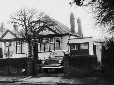 A Hillman police car in the driveway of Peter and Helen Kroger's bungalow in Ruislip, 9th January 1961. The Krogers, whose real names were Morris and Lona Cohen, had just been arrested for their involvement in the Portland Spy Ring, which leaked British military secrets to the Soviets. (Photo by Keystone/Hulton Archive/Getty Images)