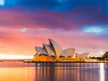 Sydney, Australia - Melbourne 25, 2018: Sydney Opera House view with the light on at dawn.